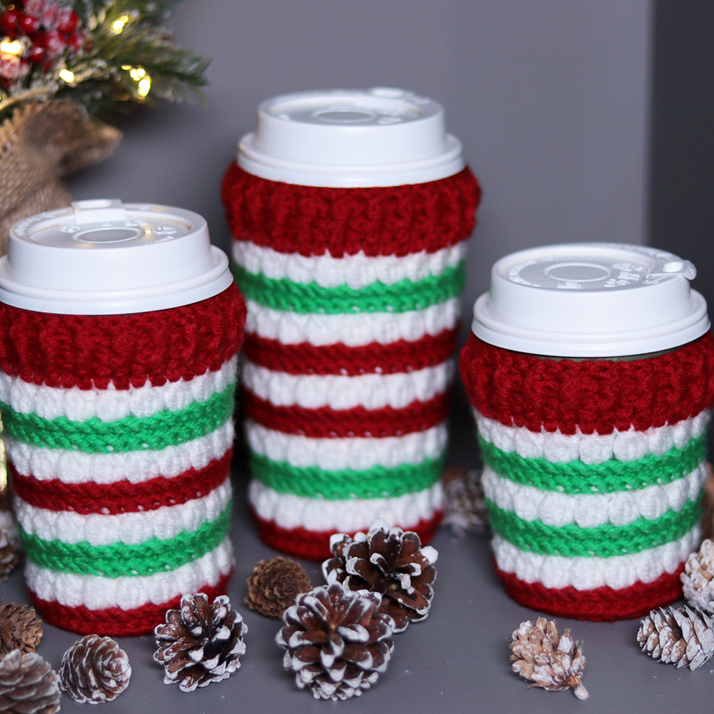Crocheted coffee cup cozies, hooked on clusters cup cozies.