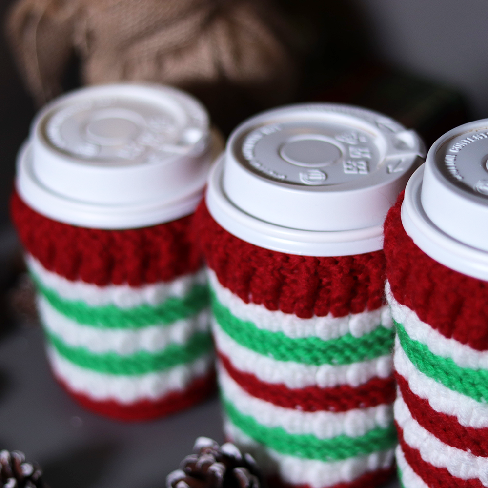 Crocheted coffee cup cozies, hooked on clusters cup cozies.