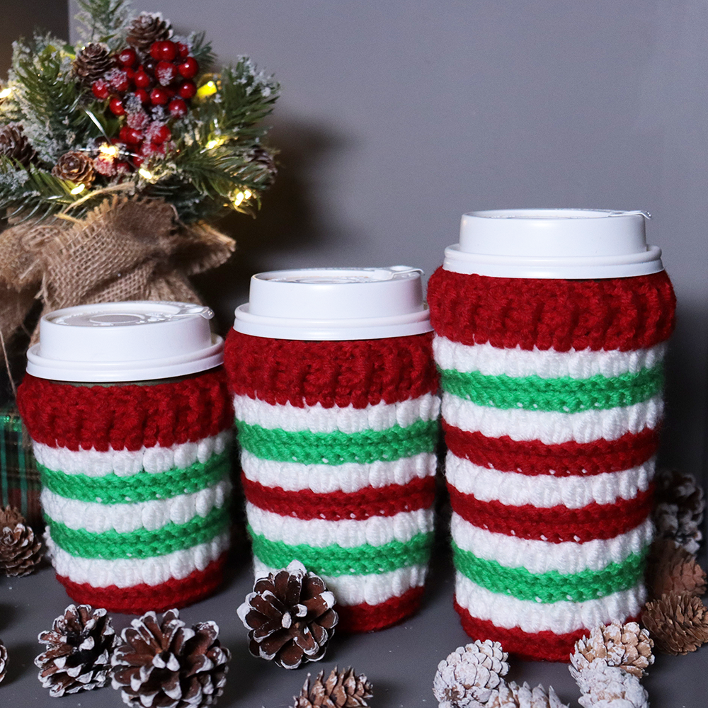 Crocheted coffee cup cozies, hooked on clusters cup cozies.