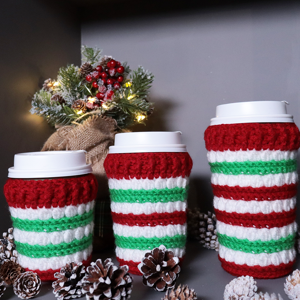 Crocheted coffee cup cozies, hooked on clusters cup cozies.