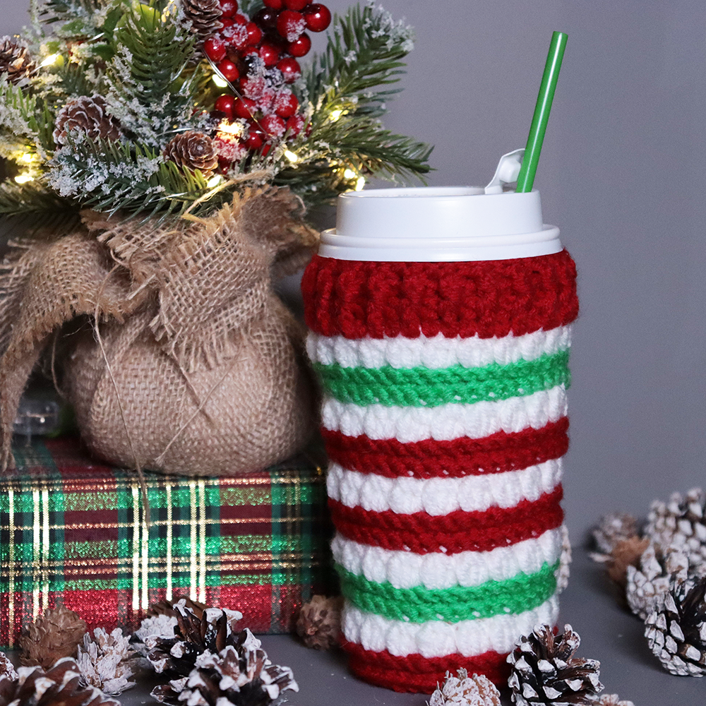 Crocheted coffee cup cozies, hooked on clusters cup cozies.